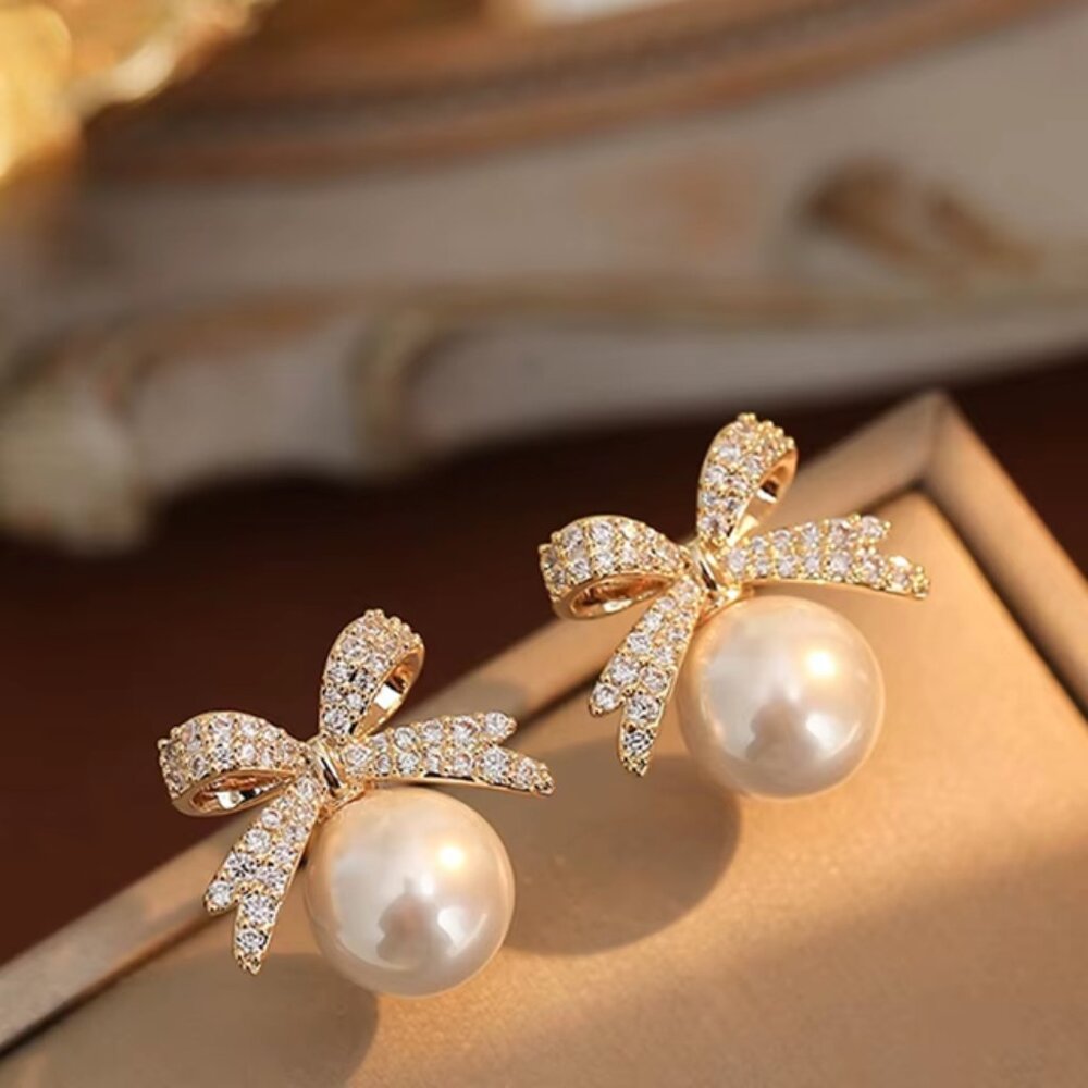 Gold Bow Pearl Drop Earrings – Elegant & Timeless